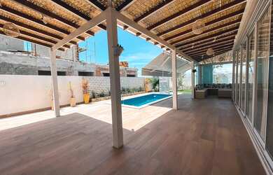 Imagem: A casa possui 4 Dormitórios, 1 Banheiro, 4 Vagas na garagem