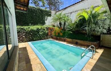 Imagem: A casa à venda possui 5 Dormitórios, 3 Banheiros, 2 Vagas