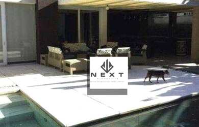 Imagem: A casa em condomínio possui 4 Dormitórios, 5 Banheiros, 4