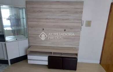 Imagem: O apartamento possui 2 Dormitórios, 1 Banheiro, 1 Vaga na garagem