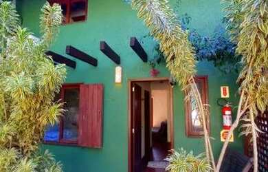 Imagem: A casa possui 5 Dormitórios, 4 Banheiros, 5 Vagas na garagem