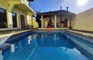 Imagem: A casa em condomínio possui 4 Dormitórios, 4 Banheiros, 4