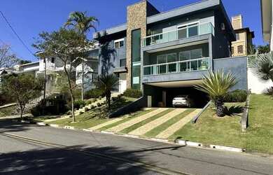 Imagem: A casa em condomínio possui 3 Dormitórios, 4 Banheiros, 5