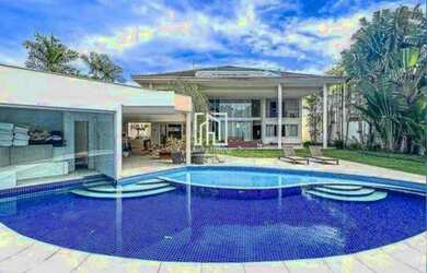 Imagem: A casa em condomínio possui 5 Dormitórios, 5 Banheiros, 4