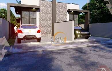 Imagem: A casa possui 3 Dormitórios, 1 Banheiro, 2 Vagas na garagem