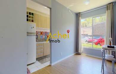 Imagem: O apartamento possui 2 Dormitórios, 1 Banheiro, 1 Vaga na garagem