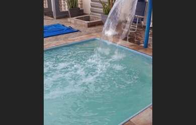 Imagem: A casa possui 2 Dormitórios, 1 Banheiro, 1 Vaga na garagem