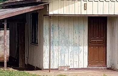 Imagem: A casa possui 2 Dormitórios, 1 Vaga na garagem, 60m² de Área