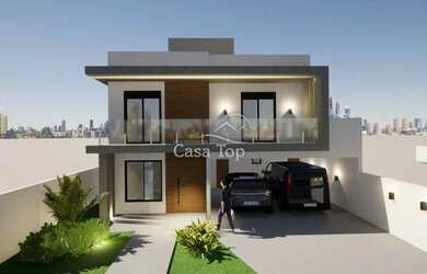 Imagem: A casa possui 3 Dormitórios, 2 Banheiros, 2 Vagas na garagem