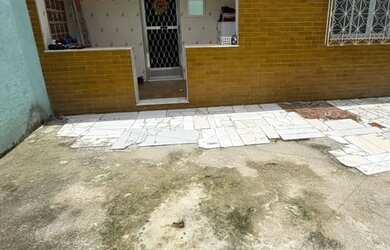 Imagem: A casa possui 3 Dormitórios, 1 Banheiro, 1 Vaga na garagem