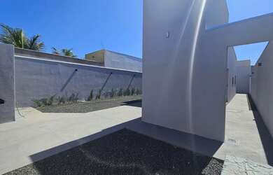 Imagem: A casa possui 2 Dormitórios, 2 Banheiros, 3 Vagas na garagem