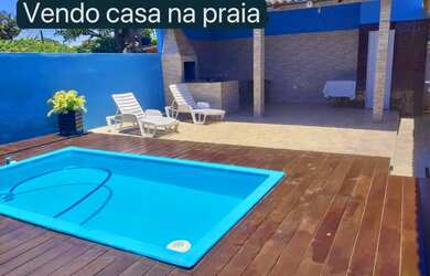 Imagem: A casa possui 3 Dormitórios, Acomodam 15 pessoas, 3 Vagas na