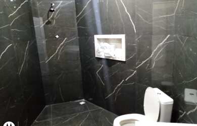 Imagem: A casa possui 3 Dormitórios, 2 Banheiros, 1 Vaga na garagem