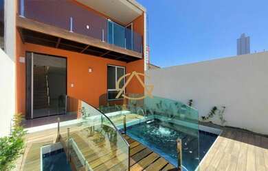 Imagem: A casa possui 5 Dormitórios, 5 Banheiros, 2 Vagas na garagem