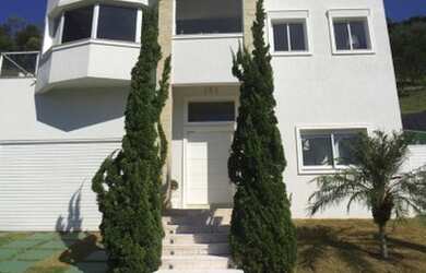 Imagem: A casa em condomínio possui 5 Dormitórios, 5 Banheiros, 5