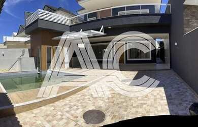 Imagem: A casa em condomínio possui 4 Dormitórios, 5 Banheiros, 4