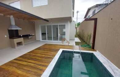 Imagem: A casa em condomínio possui 4 Dormitórios, 4 Banheiros, 2