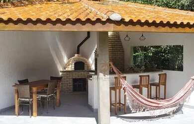 Imagem: A casa em condomínio possui 4 Dormitórios, 4 Banheiros, 4