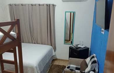 Imagem 4: Suite Pousada Ubatuba. Ar-condicionadoeÁrea de serviço