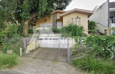 Imagem: A casa possui 5 Dormitórios, 4 Banheiros, 2 Vagas na garagem