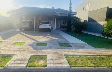 Imagem: A casa em condomínio possui 4 Dormitórios, 3 Banheiros, 4