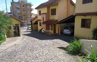 Imagem: A casa em condomínio possui 2 Dormitórios, 2 Banheiros, 1