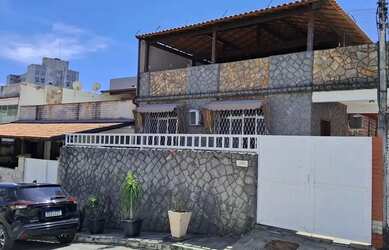 Imagem: A casa em condomínio possui 4 Dormitórios, 3 Banheiros, 2