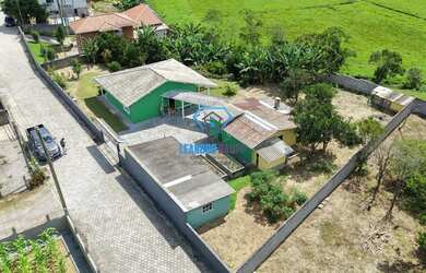 Imagem: A casa possui 2 Dormitórios, 1 Banheiro, 1 Vaga na garagem