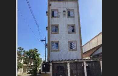 Imagem: A casa possui 3 Dormitórios, 1 Banheiro, 1 Vaga na garagem