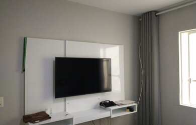 Imagem: A casa possui 3 Dormitórios, 2 Banheiros, 4 Vagas na garagem