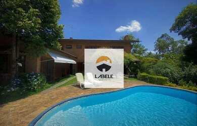 Imagem: A casa em condomínio possui 4 Dormitórios, 5 Banheiros, 5