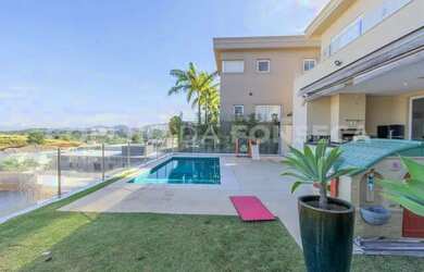 Imagem: A casa em condomínio possui 4 Dormitórios, 5 Banheiros, 5