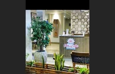 Imagem 1: Suite Pousada Ubatuba. Ar-condicionadoeÁrea de serviço