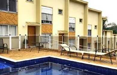 Imagem: A casa em condomínio possui 2 Dormitórios, 3 Banheiros, 2