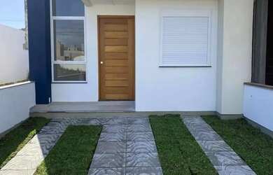 Imagem: A casa possui 2 Dormitórios, 2 Banheiros, 1 Vaga na garagem