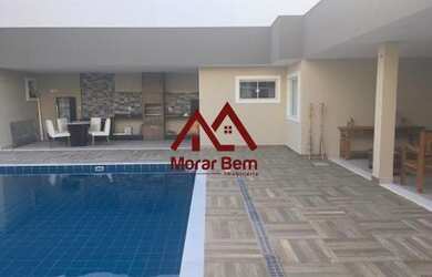 Imagem: A casa em condomínio possui 5 Dormitórios, 5 Banheiros, 4