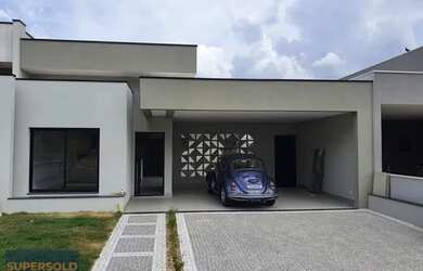 Imagem: A casa possui 3 Dormitórios, 5 Banheiros, 4 Vagas na garagem