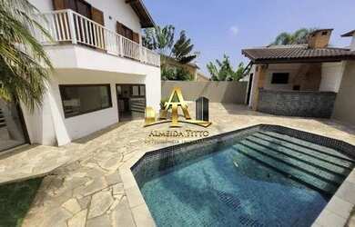 Imagem: A casa em condomínio possui 5 Dormitórios, 5 Banheiros, 5