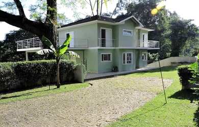 Imagem: A casa em condomínio possui 4 Dormitórios, 3 Banheiros, 4