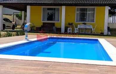 Imagem: A casa em condomínio possui 5 Dormitórios, 1 Banheiro, 2 Vagas