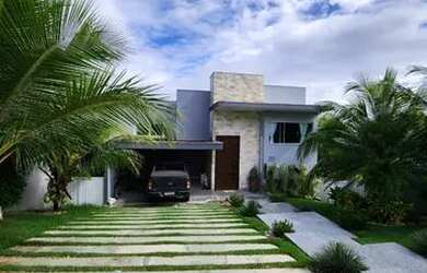 Imagem: A casa possui 4 Dormitórios, 5 Banheiros, 2 Vagas na garagem