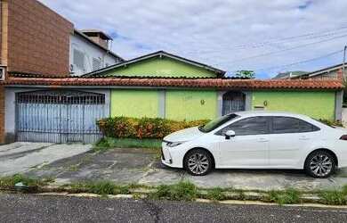 Imagem: A casa possui 3 Dormitórios, 2 Banheiros, 2 Vagas na garagem