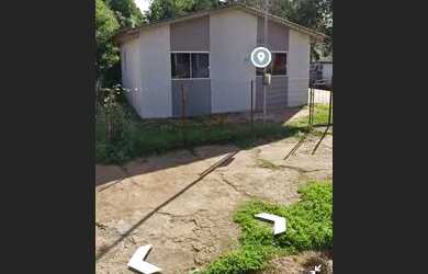 Imagem: A casa possui 2 Dormitórios, 1 Banheiro, 1 Vaga na garagem