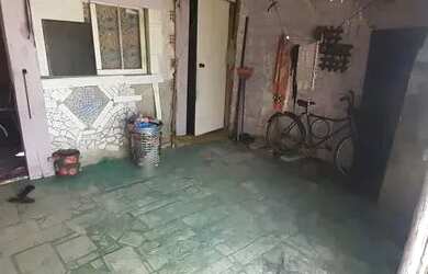 Imagem: A casa possui 3 Dormitórios e 1 Banheiro e está localizado