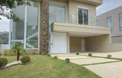 Imagem: A casa em condomínio possui 4 Dormitórios, 5 Banheiros, 4