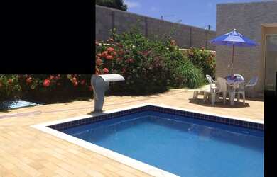 Imagem: A casa possui 4 Dormitórios, 3 Banheiros, 100m² de Área