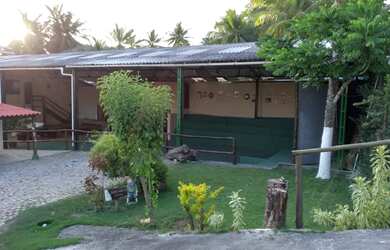 Imagem: A casa possui 5 Dormitórios e Acomodam 20 pessoas e está localizado