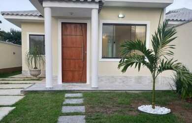 Imagem: A casa possui 3 Dormitórios, 3 Banheiros, 10m² de Área e