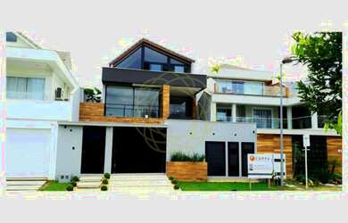 Imagem: A casa em condomínio possui 4 Dormitórios, 4 Banheiros, 1