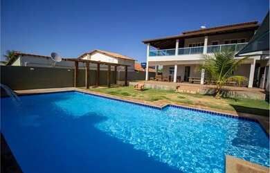 Imagem: A casa possui 5 Dormitórios, 5 Banheiros, 5 Vagas na garagem